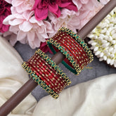Vriksham Starry Bloom Red Glass Bangles with Floral Emerald Kundan Work-G19839
